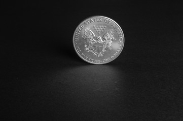 One US dollar coin silver - business concept, background