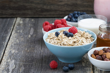 fresh breakfast products on a dark wooden background, horizontal