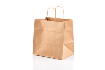 Paper shopping bag on white