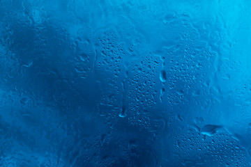 Drops of rain on glass