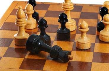 Chess black king gives up on chessboard