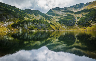 Fototapeta premium The Wildseeloder mountain reflected in Wildsee , area Kitzbüheler Alps ,Fieberbrunn, Tyrol, Austria