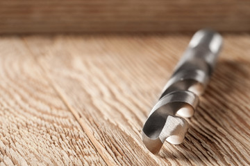 drill bit on a wooden in workplace