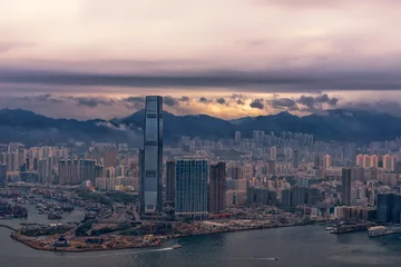 Tuinposter Misty morning view of Victoria harbor of Hong Kong city © kingrobert