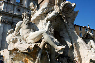 Detail of the "Fountain of the Four Rivers", showing the rivergod Ganges, Piazza Navona, Rome, Italy