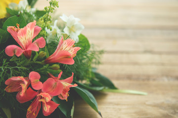 Bouquet of flowers on a wooden table