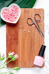 salt and cream for nail care in spa top view