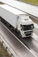 truck moves on highway © Yuri Bizgaimer