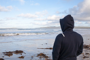 Surfer looking for waves Ireland