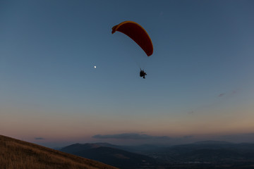 The paraglider and the moon