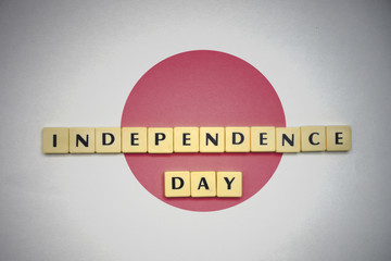 letters with text independence day on the national flag of japan.