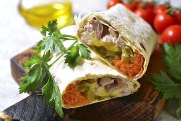 Shawarma with chicken and pickled vegetables.