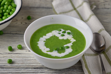 Homemade green pea soup with cream