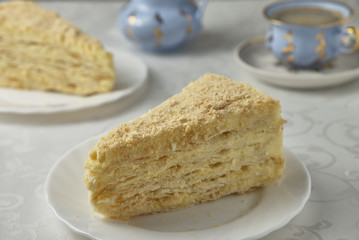 Delicious dessert cake with cream and coffee