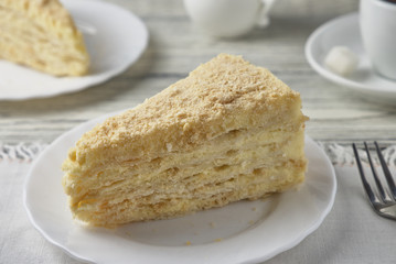 Delicious dessert cake with cream and coffee