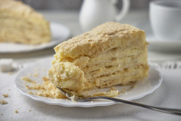 Delicious dessert cake with cream and coffee