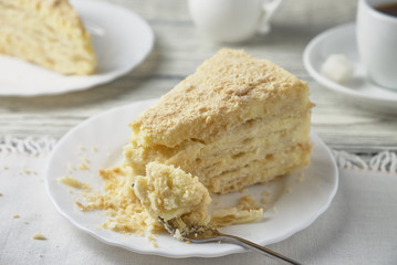 Delicious dessert cake with cream and coffee