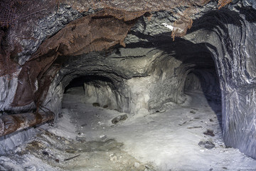 Entrance to abandoned chalk mine, fork in the tunnel