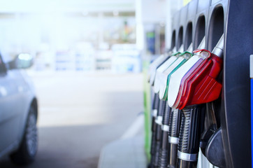 Gas station. Fuel dispenser and car ready to be filled up at petrol pump station.