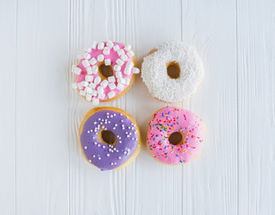 Different colorful sweet donuts