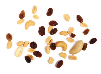 Healthy food, pile of mixed nuts, cashews, peanuts, hazelnut, raisins, brazilian nut, almond,...