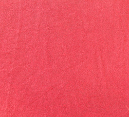 Fototapeta premium Red textured leather skin background closeup