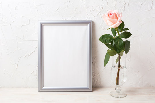 Silver frame mockup with soft pink rose in exquisite vase
