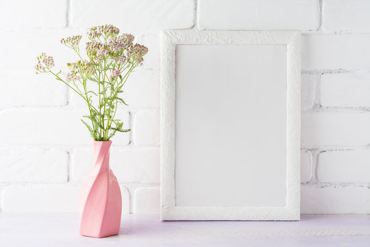 White frame mockup with creamy pink flowers in swirled vase