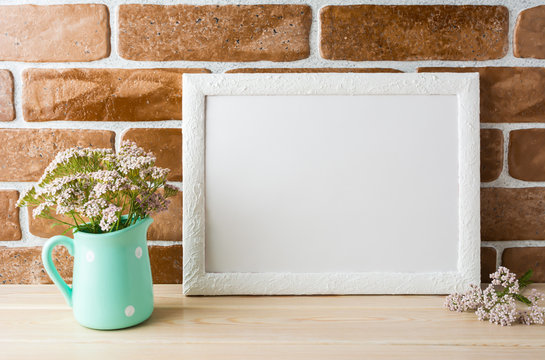 White landscape frame mockup creamy pink flowers in mint pitcher
