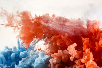 Abstract Red and Blue Paint in Water Background
