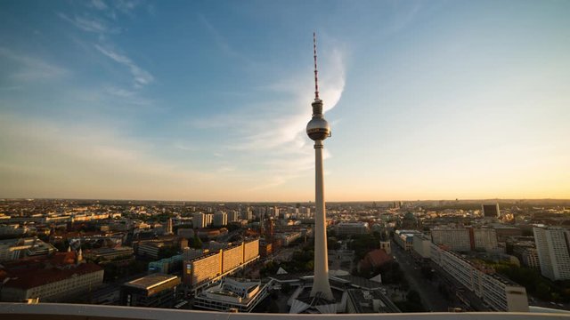 Clouds flying over TV tower at Alexanderplatz in Berlin on sunset. Full HD, time-lapse.