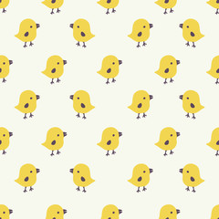 Seamless pattern with cartoon yellow chicks. Easter greeting cards, Hand drawn background