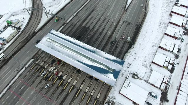 A high-speed toll booths are of Western High-Speed Diameter in St. Petersburg, Russia. Aerial view from drone at winter
