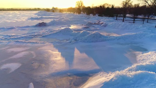 Lake Winnebago, WI, Ice shoves build small mountains of ice along the shoreline; sometimes destructive, they are driven by winds that grip the surface ice and jamb it into the opposite shore.