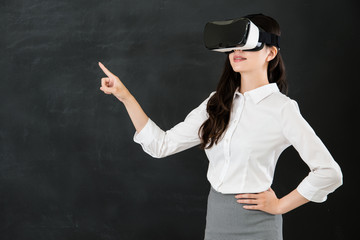 asian woman teacher touch screen with VR headset