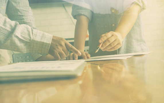 Financial,accounting,investment Advisor Consulting With Young Man At Classroom. Business Adviser And Young Student Planing The Business Start Up,man Meeting Banker,Selective Focus,Vintage Tone