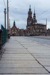 Obraz premium Dresden Catholic Church Overcast Weather Bridge View Exterior Architecture Famous Building