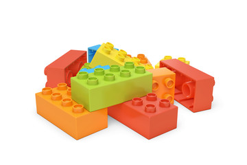3d rendering of several colorful toy bricks lying on white background.