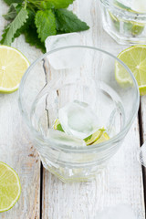 lime, mint, glass with ice close-up