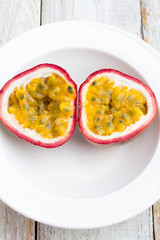 passion fruit with a close-up on a white plate