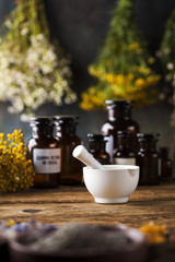 Medicine bottles and herbs background