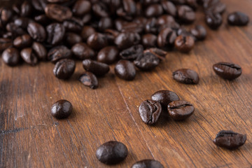Coffee beans on old wood