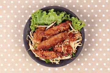 Fried steamed grated radish with shallot and bean sprouts.
