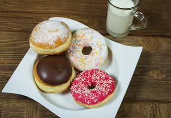 Delicious donuts with milk
