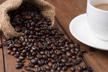 Coffee cup and coffee beans