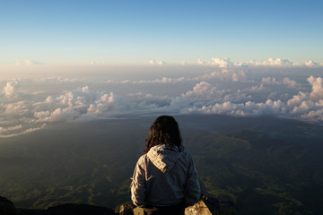 man standing over clouds