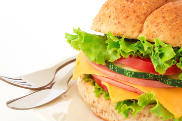 burger sandwiches bread with bacon , ham and cheese with vegetable , healthy breakfast on white background , healthy breakfast food concept
