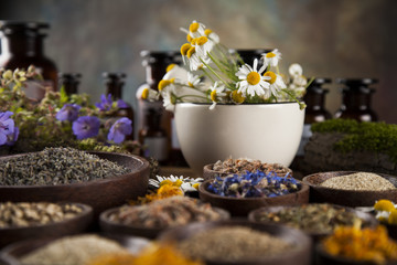 Fototapeta na wymiar Natural medicine on wooden table background
