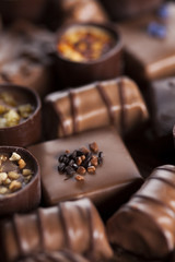 Praline Chocolate on wooden backgroud