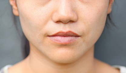 Asian girl mouth close up.